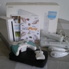 Wii + 4 manettes + jeux